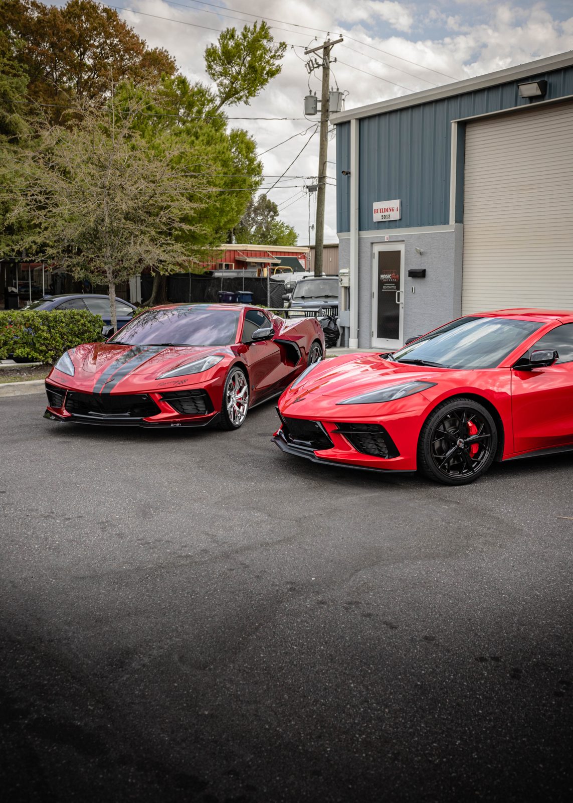 Detailed red and orange cars lined up, mobile detailing Roxboro NC