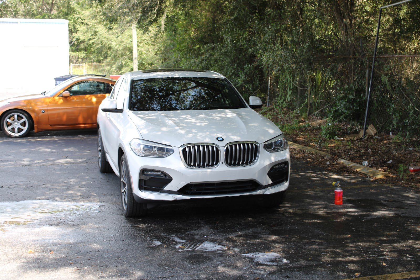 Detailed BMW X4 SUV after a mobile detail in a Durham driveway